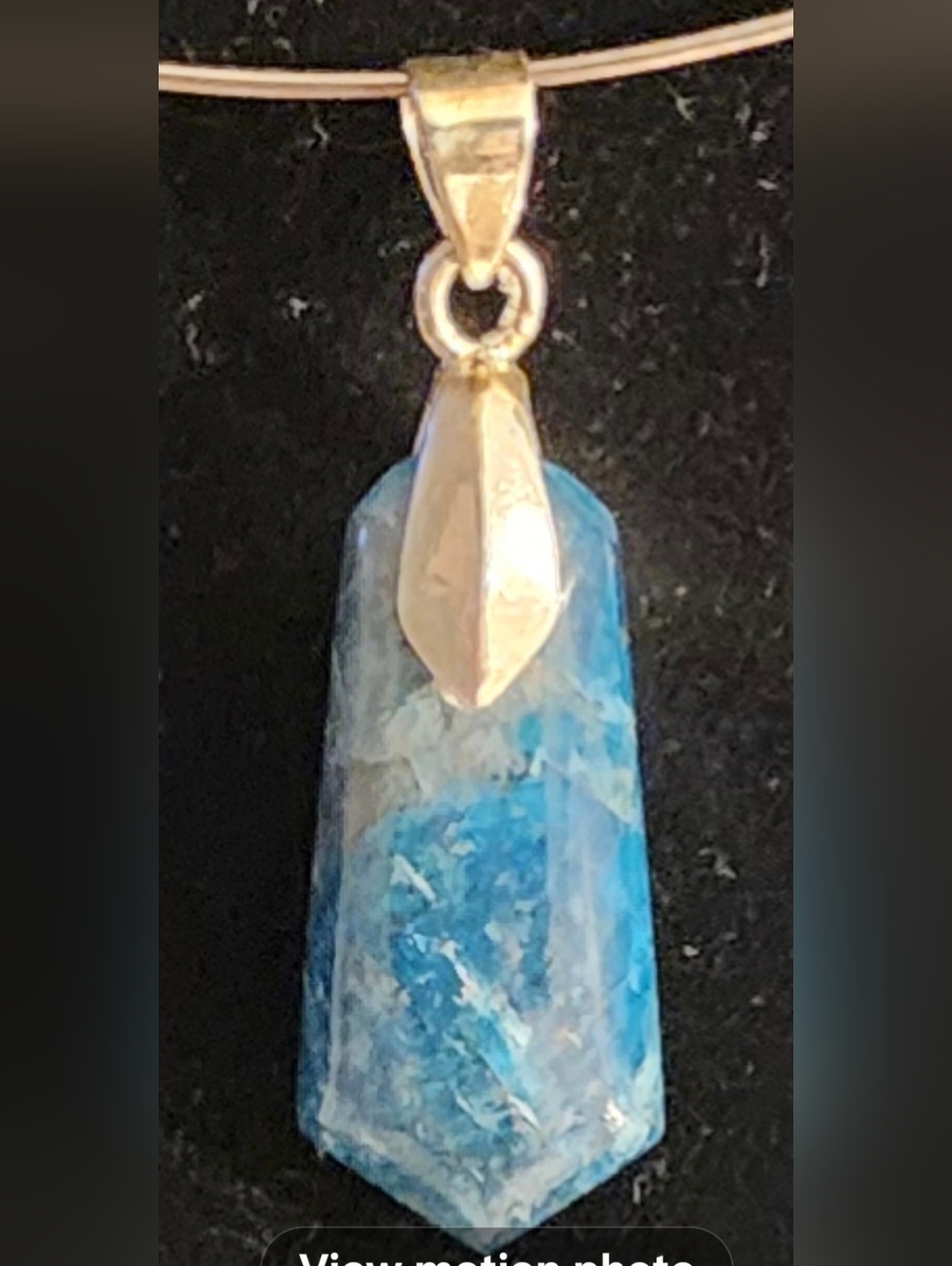 Blue aragonite point pendant featuring a natural gemstone